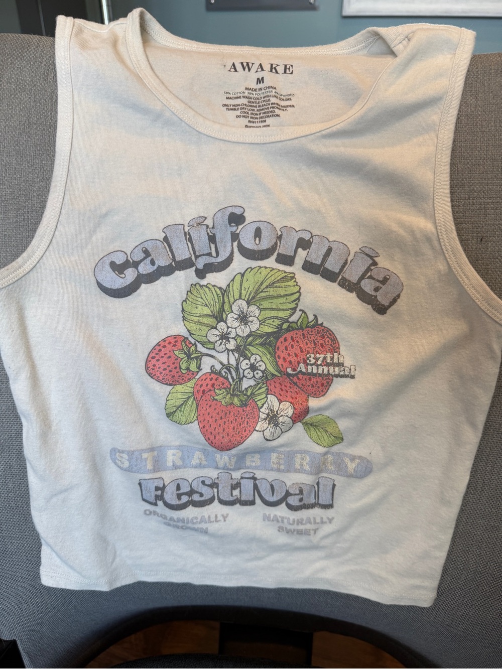Awake Junior’s White Tank Top with Red Strawberry Graphic